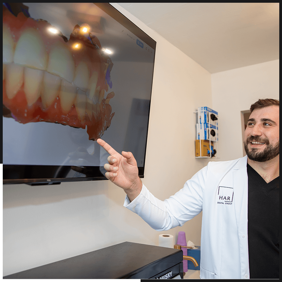 patient going over 3d scan of patient teeth