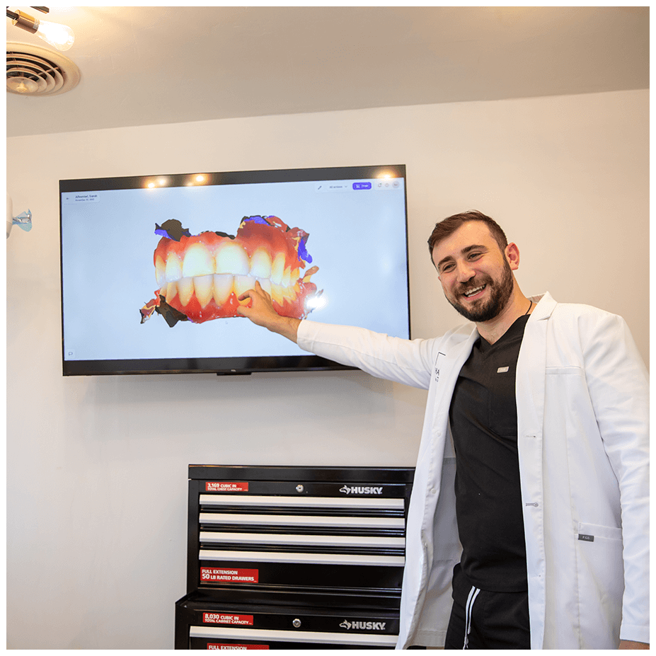 doctor going over 3d scan of teeth