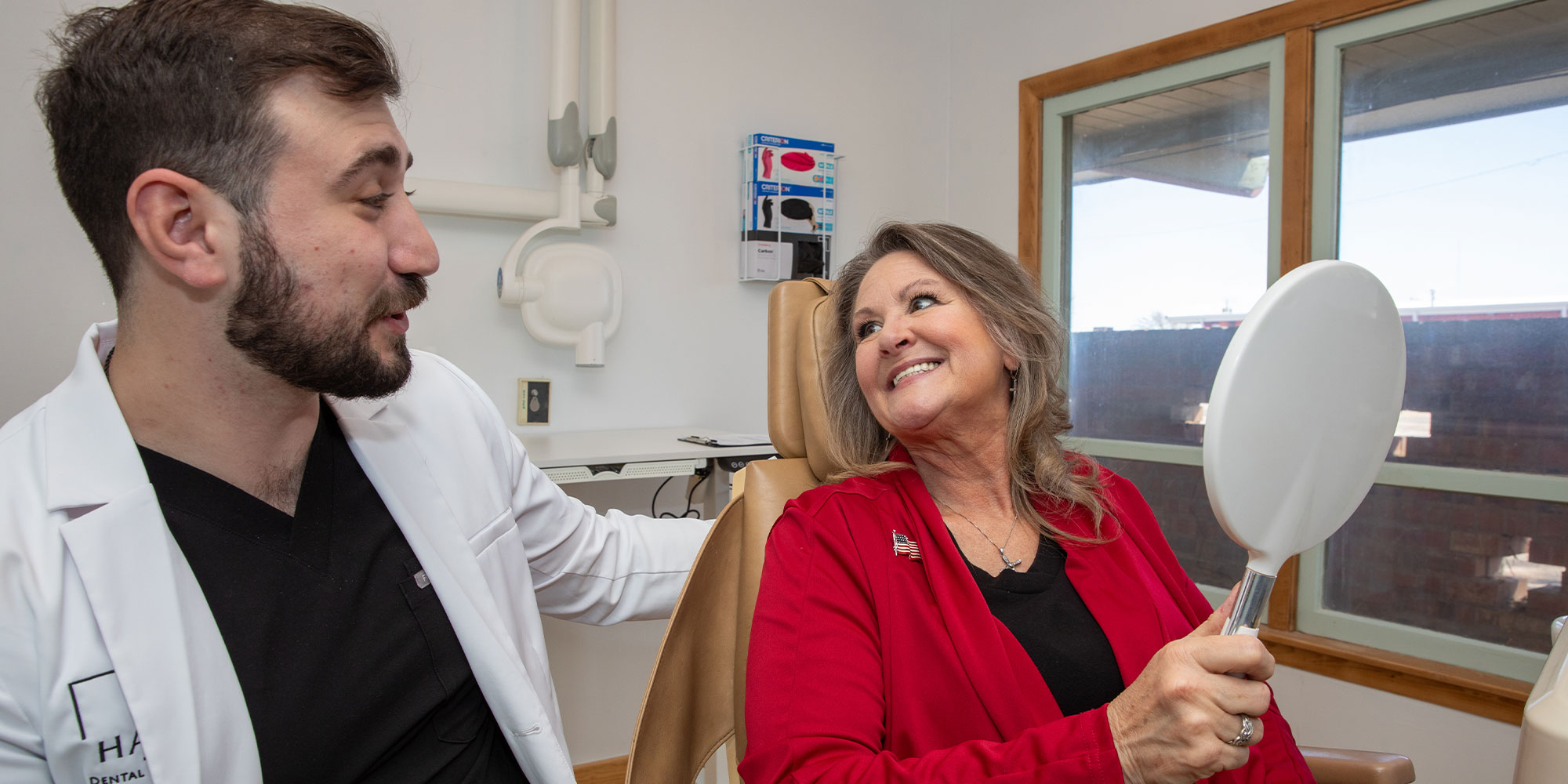 doctor laughing with patient