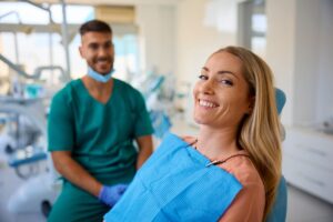 Dentist consulting patient in modern clinic setting